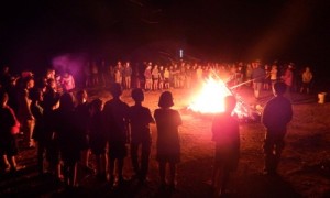 Scouts around camp fire